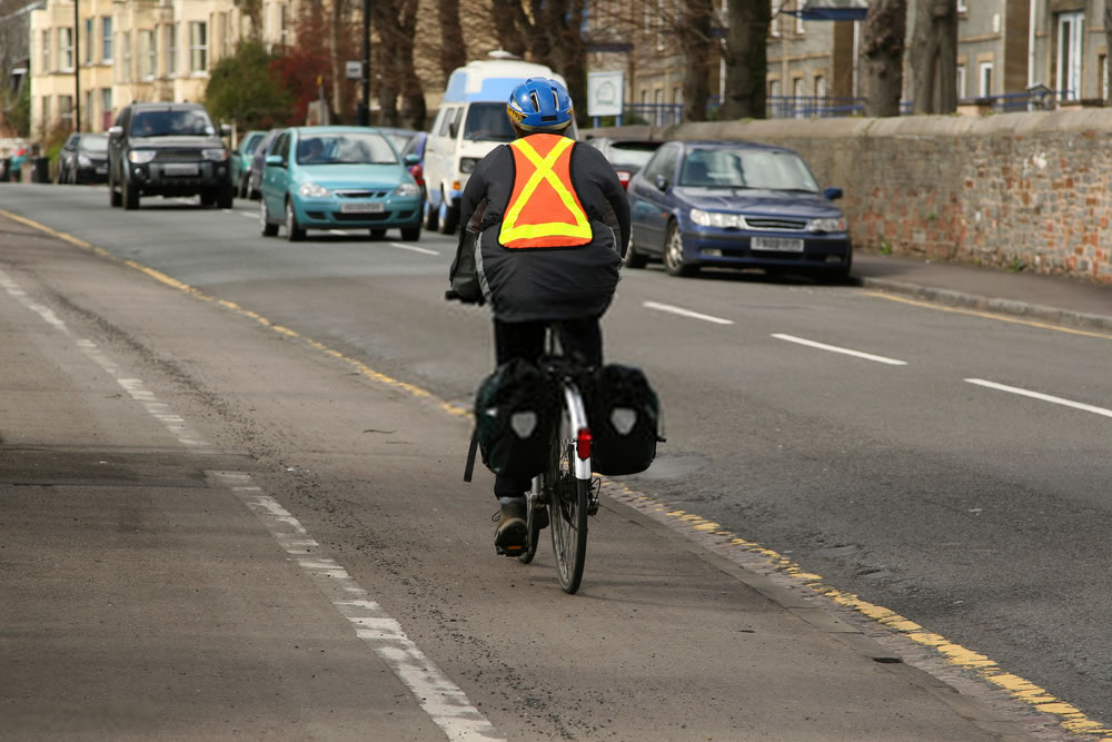 cyclists with reflective safety vest